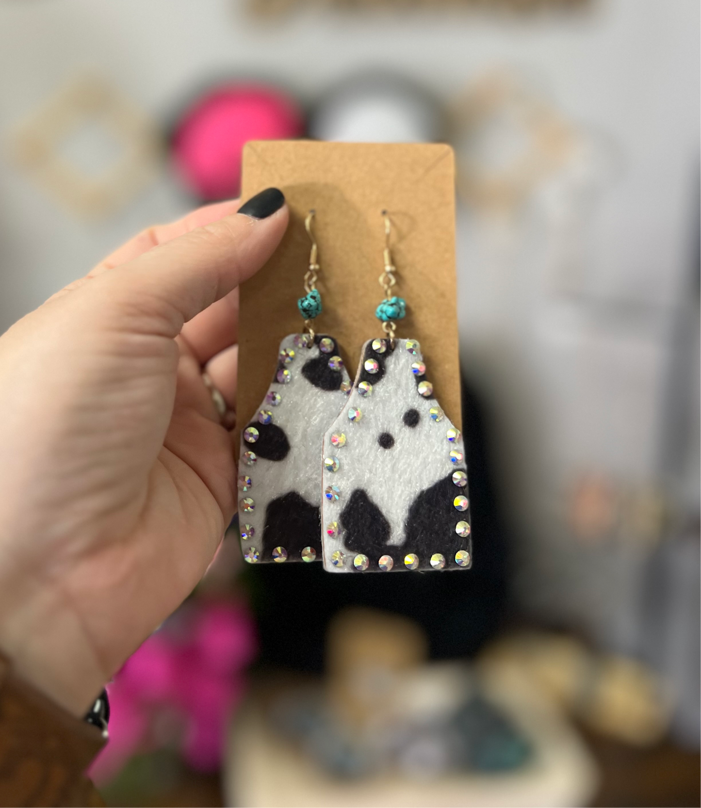 Ear tag cow print earrings